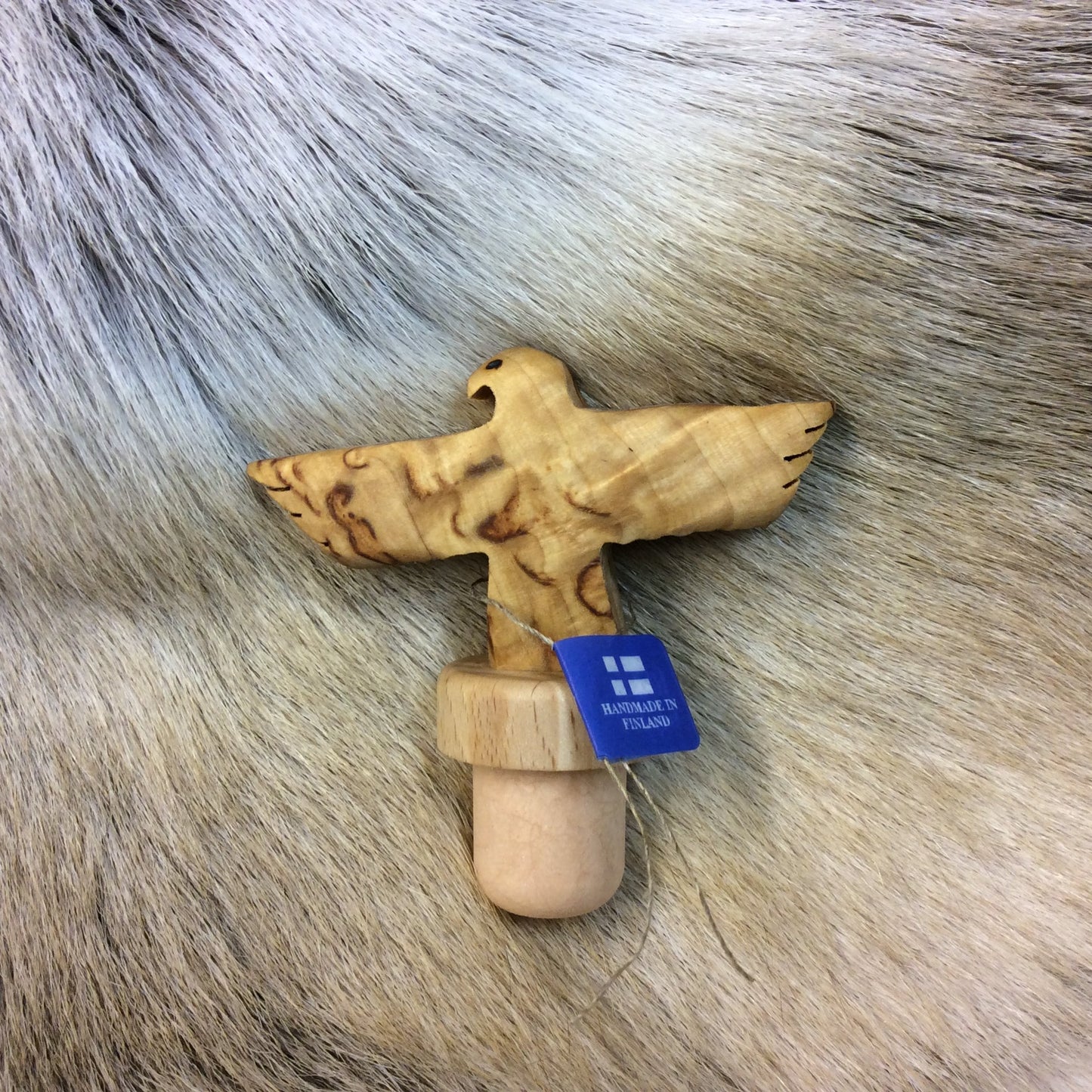 2357 Pullonkorkki, kotka lentävä