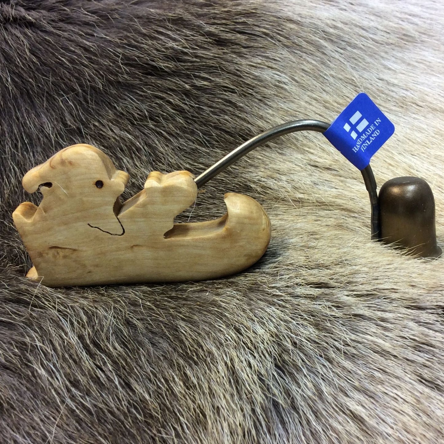 31-135 Kynttilänsammutin, joulupukki reessä