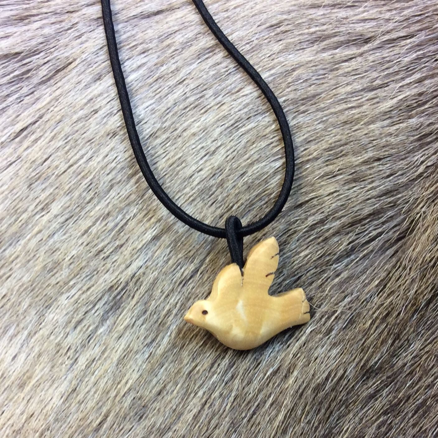 Rubberband necklace, Dove